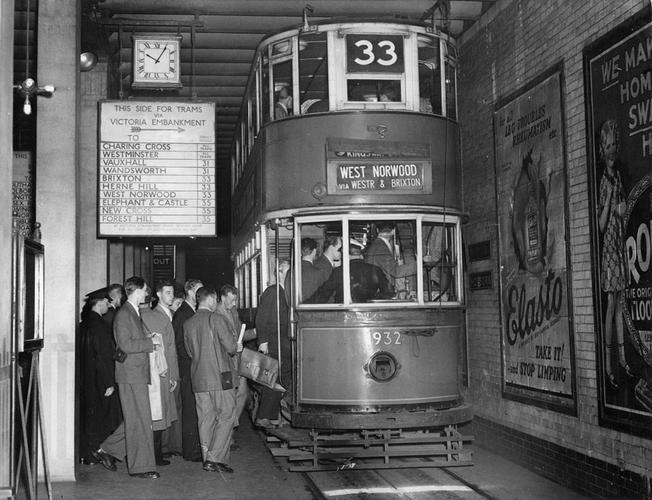 Old photo of a double decker London tram.